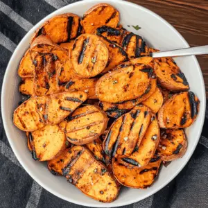 Juicy, smoky, and slightly sweet, these Grilled Sweet Potatoes are the perfect side for any summer barbecue! Simply slice, season, and grill to enhance their natural flavors. They’re not just delicious but packed with nutrients too. Save this easy recipe for your next cookout or family gathering! Perfect for impressing friends or enjoying a cozy meal at home.