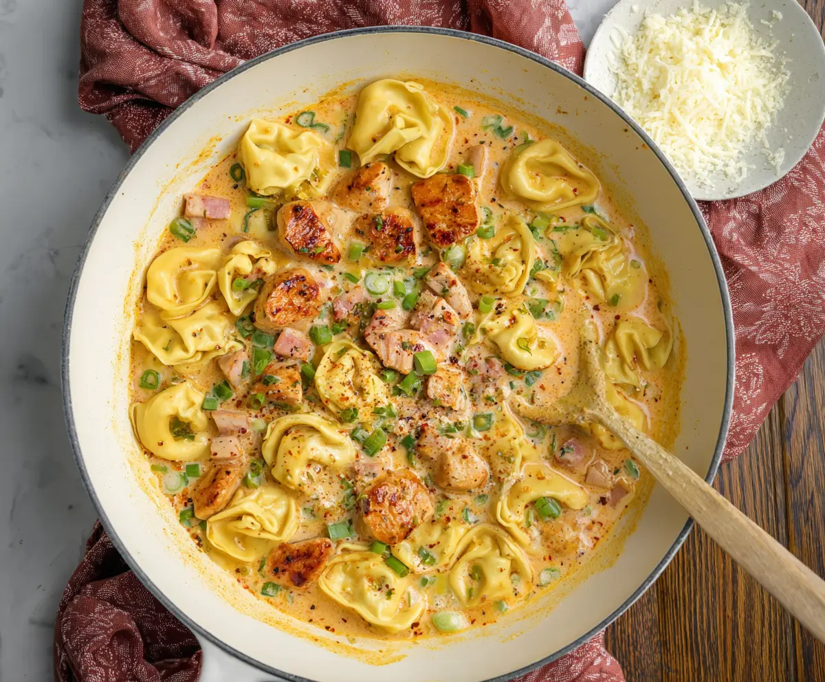 Delicious Cajun Chicken Tortellini pasta dish with spicy seasoning and creamy sauce