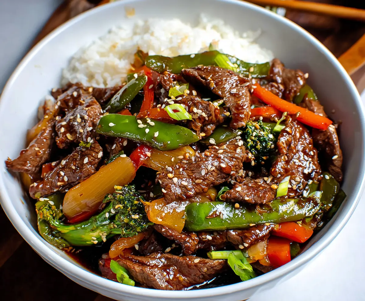 Delicious beef stir fry with colorful vegetables served in a bowl
